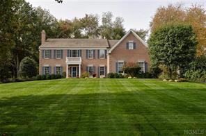 Welcome to your new home! Breathtaking front lawn offers unsurpassed curb appeal!