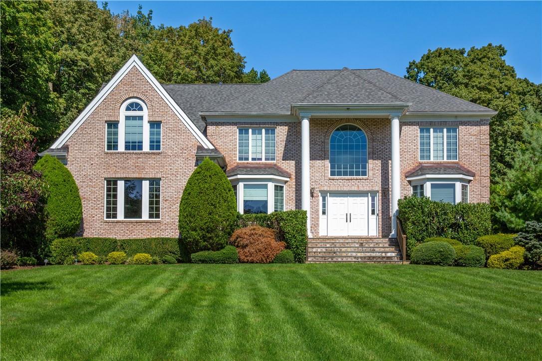 Traditional on the outside and transitional style on the inside of 28 Stonewall Circle
