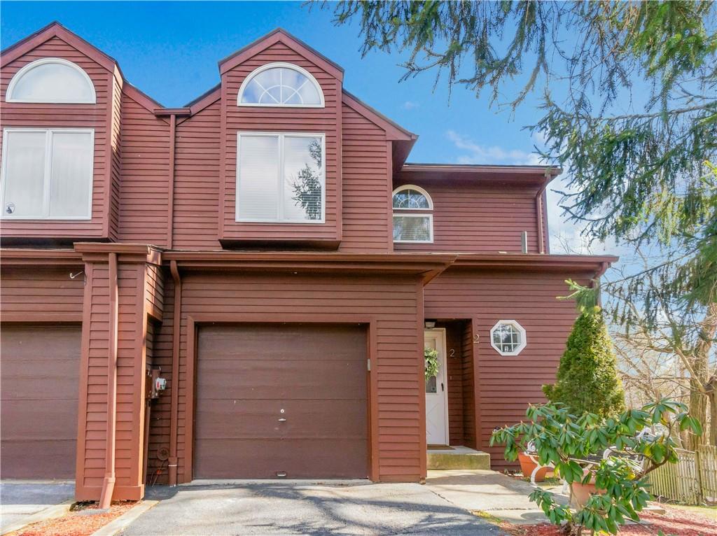Welcome to Liberty Knoll! This sunny and spacious end unit offers three exposures and a finished walk out lower level. The rear deck offers gorgeous views of the village. This unit is walking distance to the clubhouse and pool.