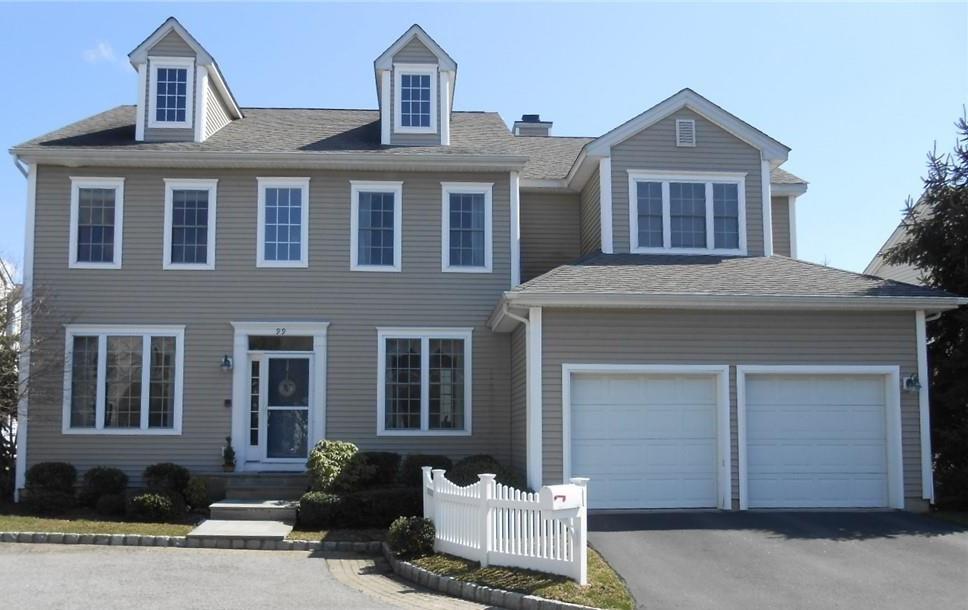 Colonial inspired home with a garage