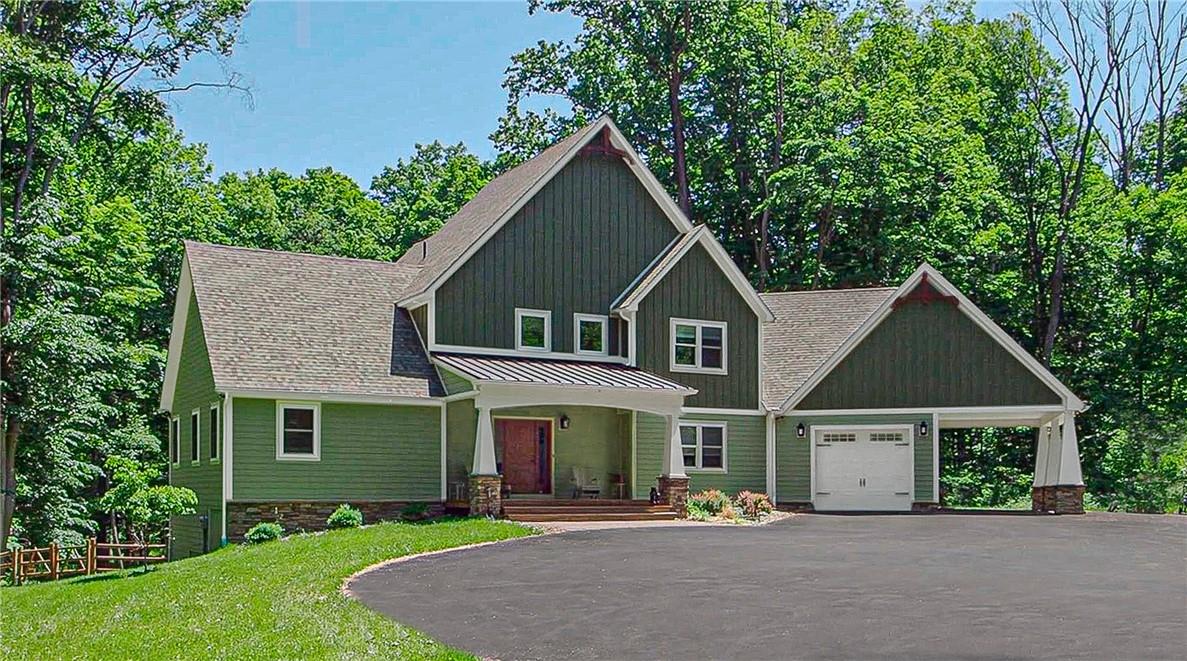 Welcome to 11 Warwick Lake Pkwy! A beautiful 3-year young Craftsman home.