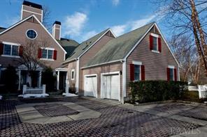 Wyndham Close complex, off Bryant Avenue in White Plains.  Plenty of parking with one car garage, assigned outside space and steps away from a bank of spaces for visitors.  Beautiful end unit that brings in light almost all day.