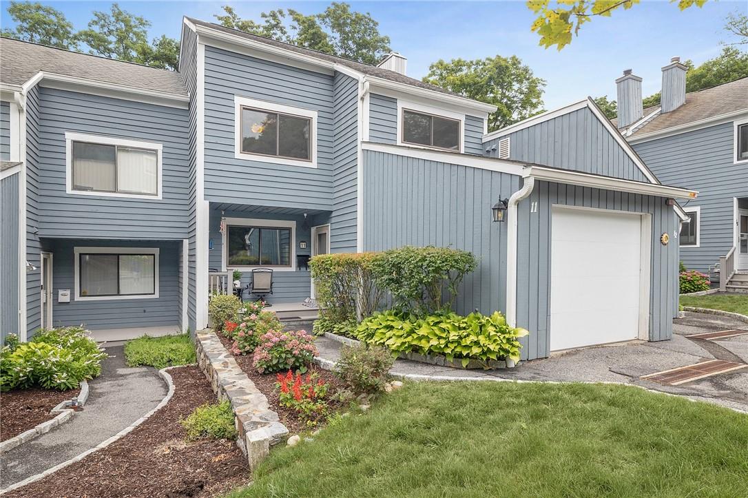 Enjoy the convenience of an attached garage and Trex Porch