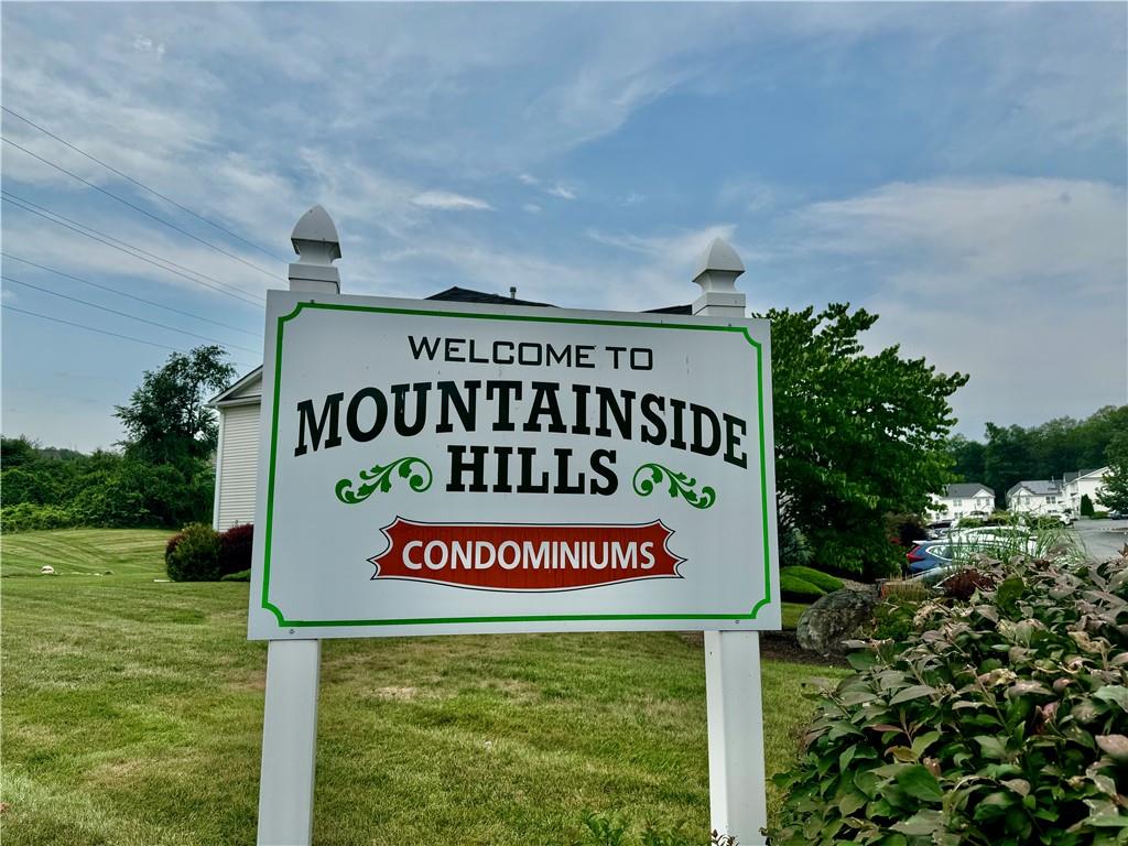 Community sign with a lawn