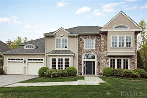 Lovely center hall stone colonial with many  upgrades.This breathtaking home lavishes in beauty. A buyers dream....