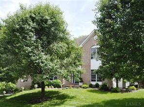 Spacious brick front Colonial in move-in condition.