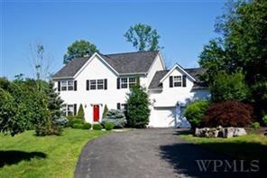 Front Of House Nestled in Cul-de-Sac.