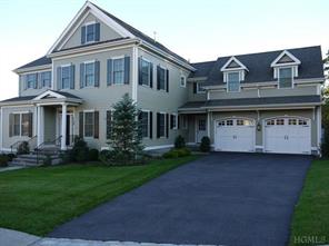 Exceptional home in gated community in Armonk.  Attention to detail throughout including distinctive wainscoting, crown moulding, custom blinds and high ceilings. Generous chef's kitchen with large granite island, open floor plan to breakfast room & famil
