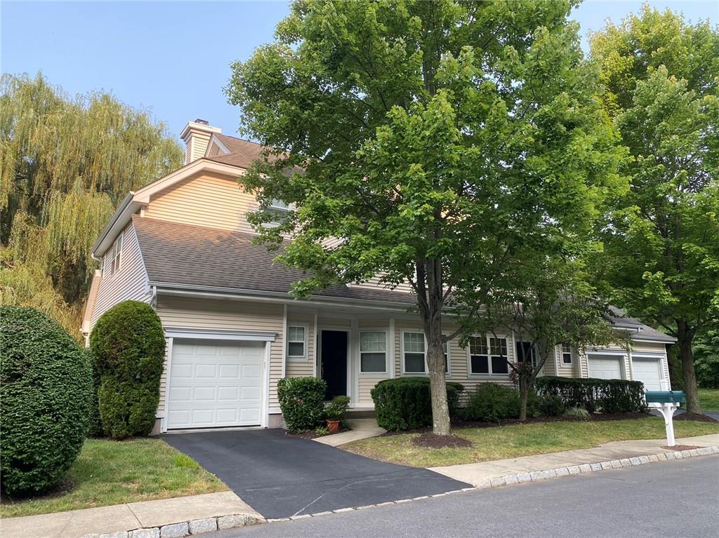 View of front of house with a front yard