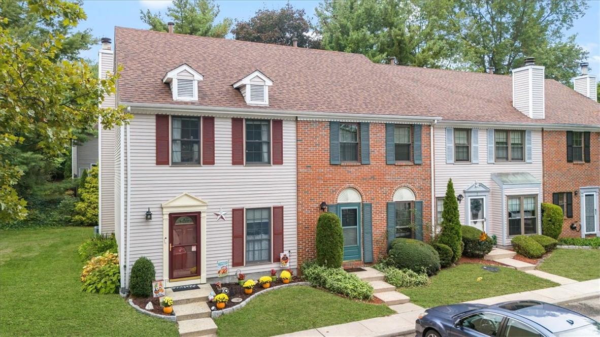 View of front of home with a front yard
