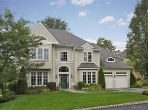 Front of Home. 2004 Colonial with two car garage in Kensington Woods. This is the Cambridge II model with the largest backyard in complex. There is a bedroom and bath on first floor and elevator for your convenience. Kensington Woods is a 52 unit private 