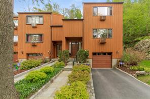 Front of home in well maintained complex