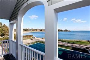 Magnificent Views from covered porch of Master Bedroom Suite. French Doors open to this enchanting balcony.