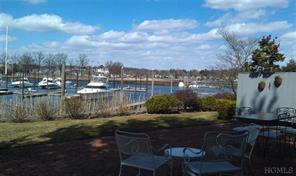 This beautiful vista can be enjoyed not only from your private terrace but from the living area on the first floor as well as the master on the second level and the office on the third. Note the private dock in the foreground where you can moor your boat.