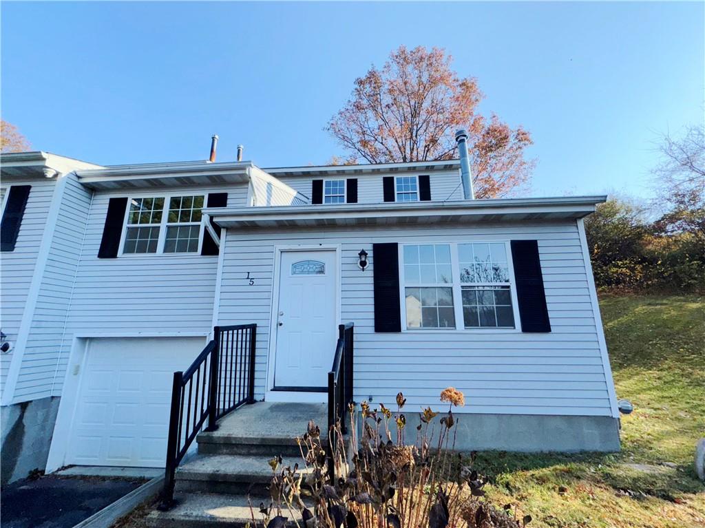 View of front of home featuring a garage
