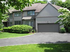 Exquisite updated townhome located in private park like setting.  New kitchen, baths, HW floors and many quality upgrades. Attached two car garage.