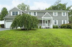 Beautiful spacious colonial is set back from the road. It's clean lines and modern color scheme will please even the most demanding buyers.