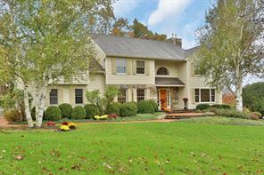 Where home begins ... an authentic brick walkway invites you to the front entrance of this fine residence.