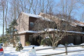 End unit Townhome at The Woods with attached garage.
