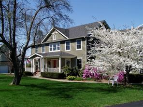 Flowering dogwood & azalea creates a gracious welcome to the front entry.