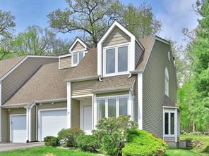 End unit with attached garage....