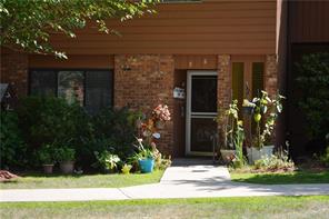 As we enter 6 Coachlight Sq. Condo. Up one flight of steps, located on 2nd floor. No one above you, private deck and wooded views. Good parking for visitors.