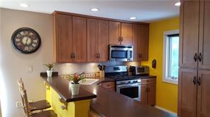 Beautiful updated kitchen with counter bar.
