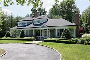 Custom Colonial located on a quiet cul de sac in Prestigious Gated Lincoln Rise.