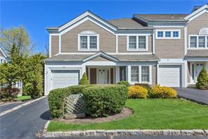 Welcome home to Gedney Commons townhouse development.  #29 is an end unit