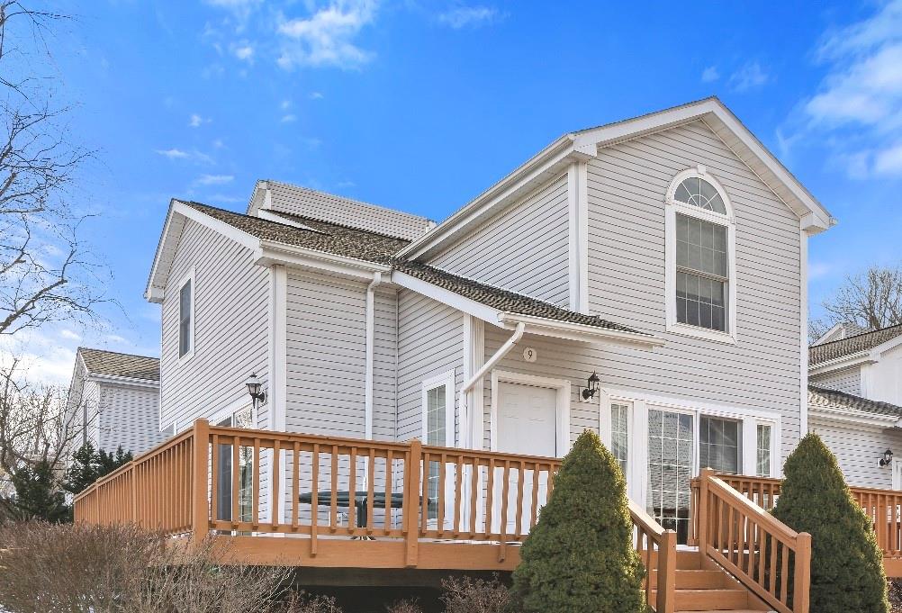 Front view w/wrap around deck.