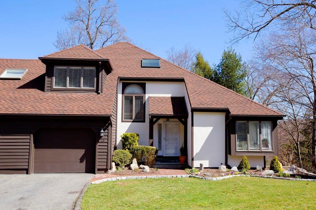 25 Cotswold Drive. End unit with beautiful landscaping and perennials
