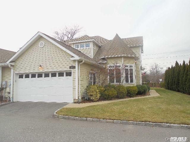2 car garage, plus 2 additional spots
