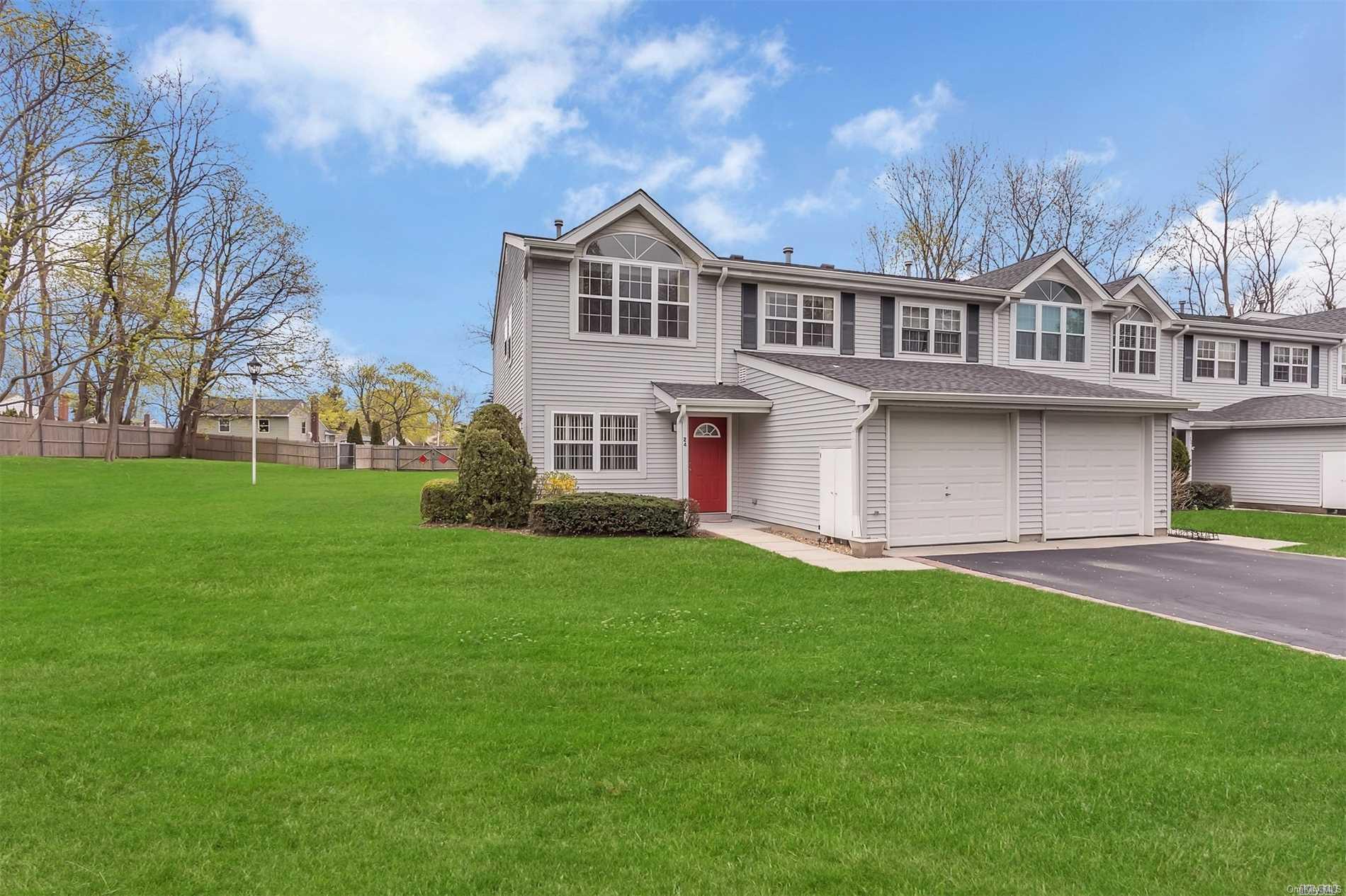 Desirable End Unit with Custom Landscaping
