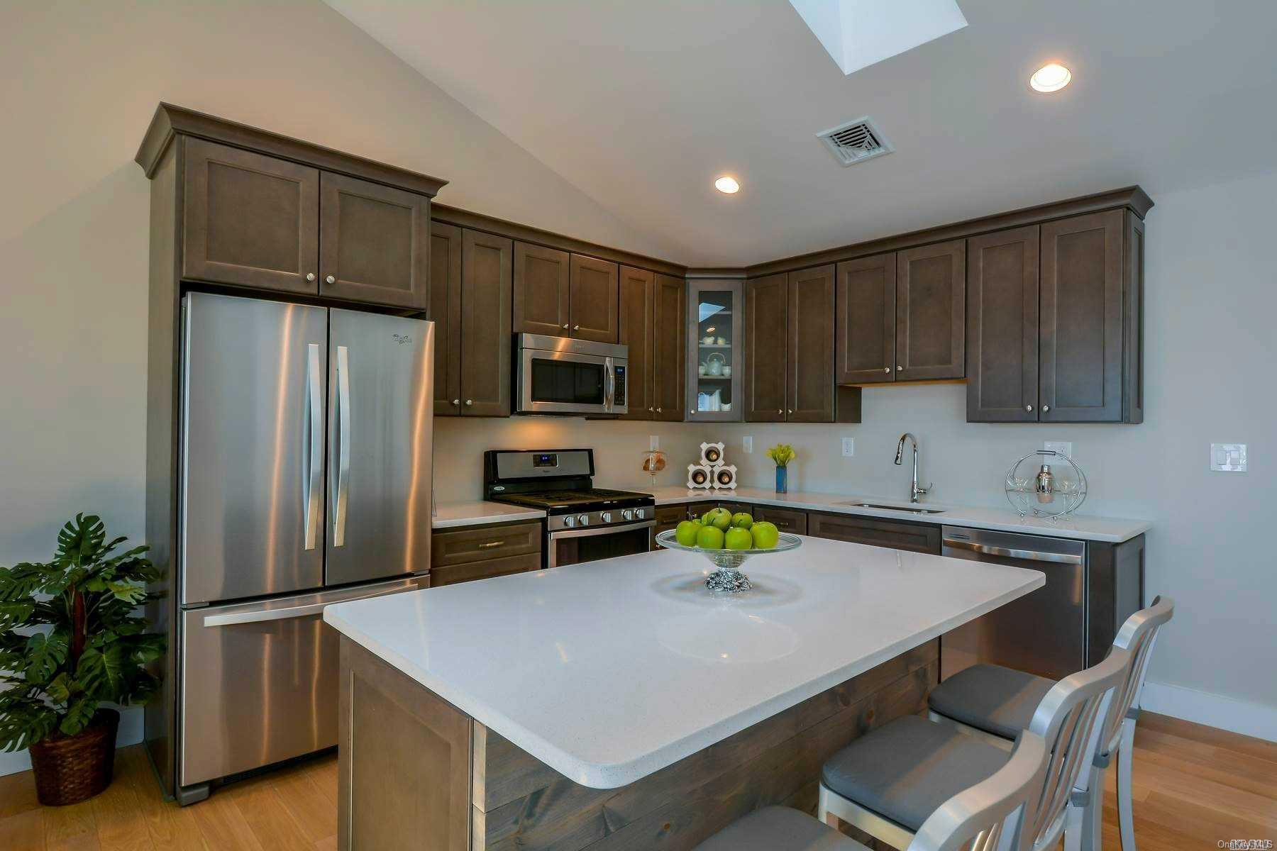 Photo is of a top floor unit