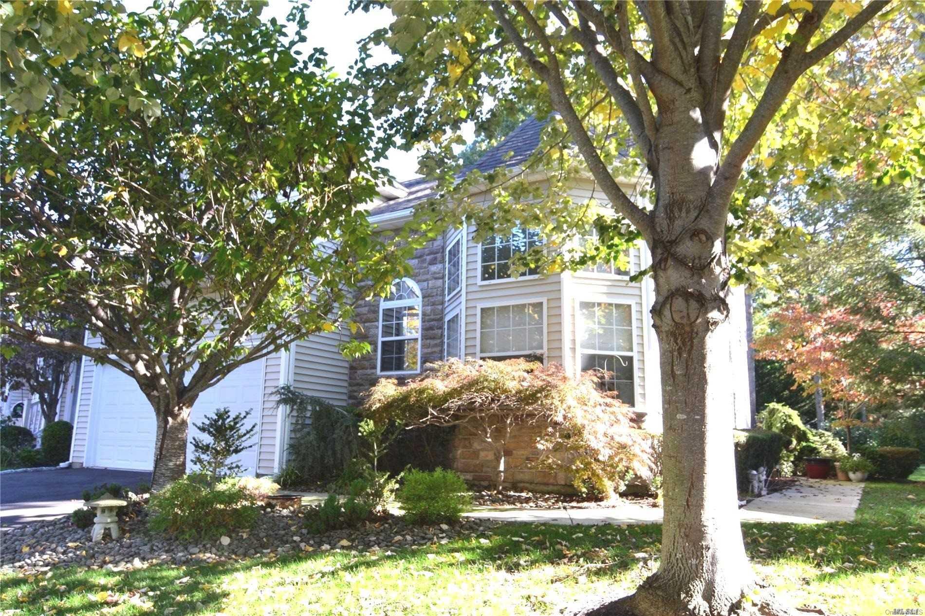 Beautifully treed front yard