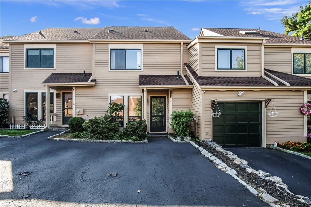 Front entrance to 4 Lisa Court with 2 parking spaces steps from front door!