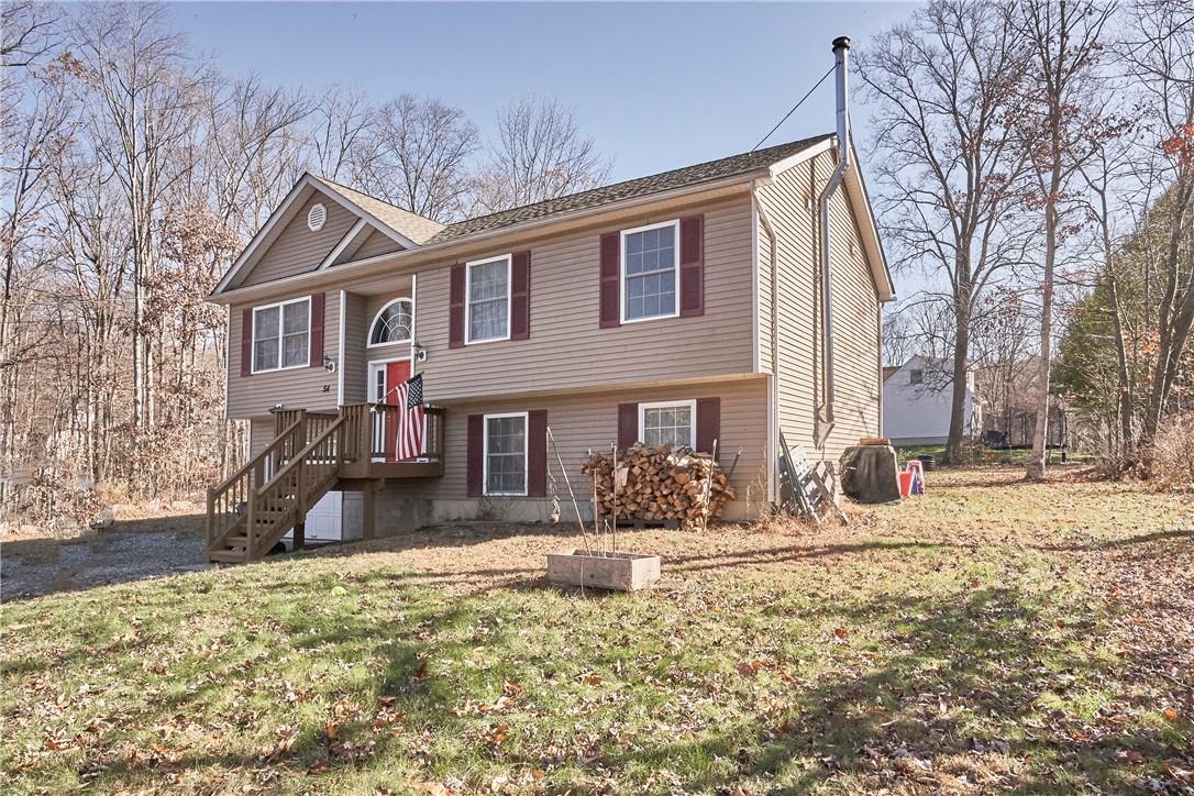 TEN YEARS YOUNG! BUILD IN 2009 THIS SPACIOUS RAISED RANCH SITS ON A LEVEL PROPERTY IN A QUIET  NEIGHBORHOOD.
