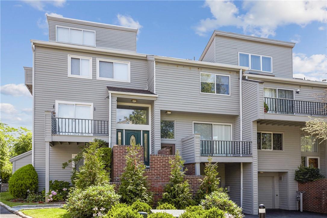 Welcome to Townhouses at Lake Isle a private gated community on 7 acres of park like property