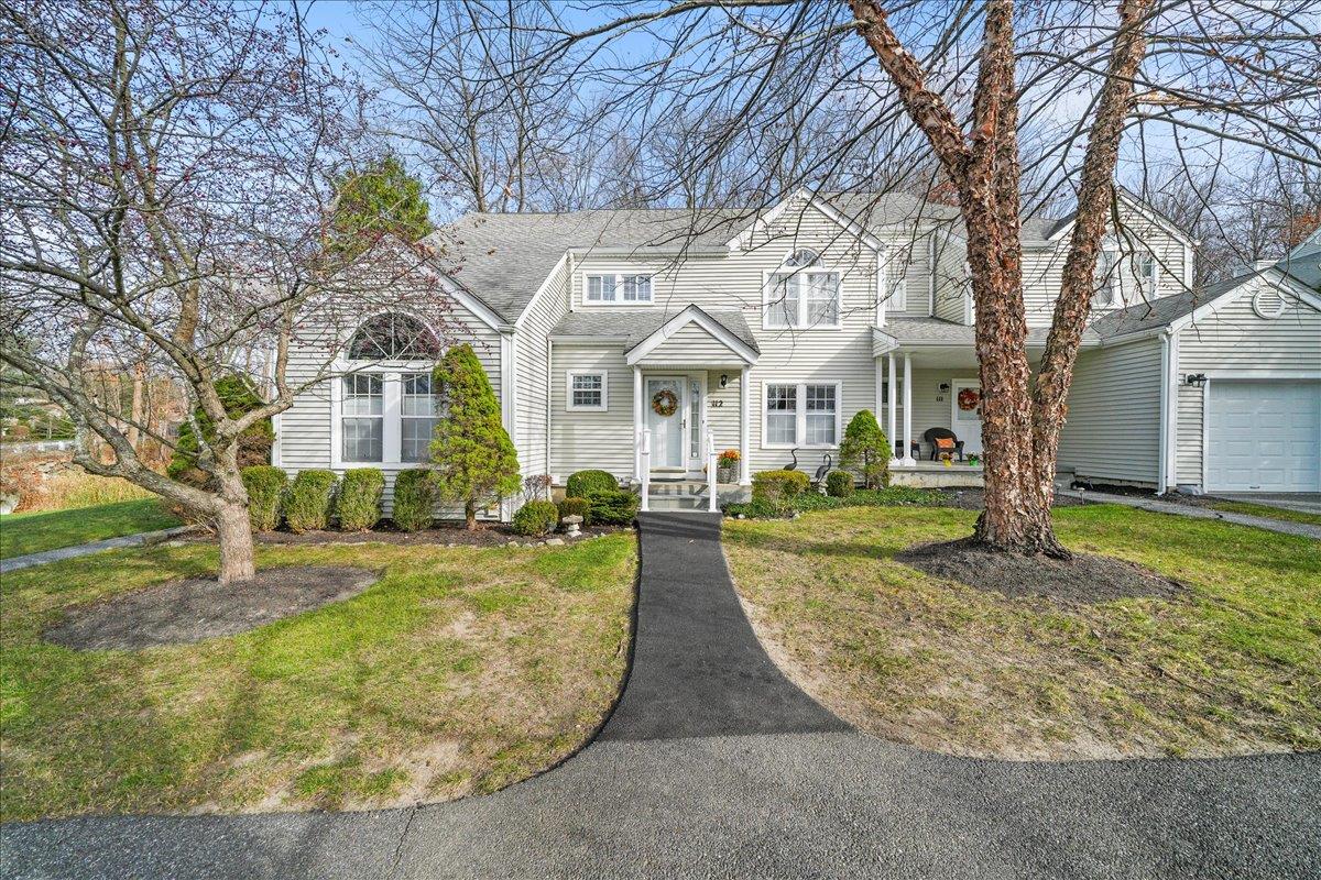 View of front of home with a front lawn
