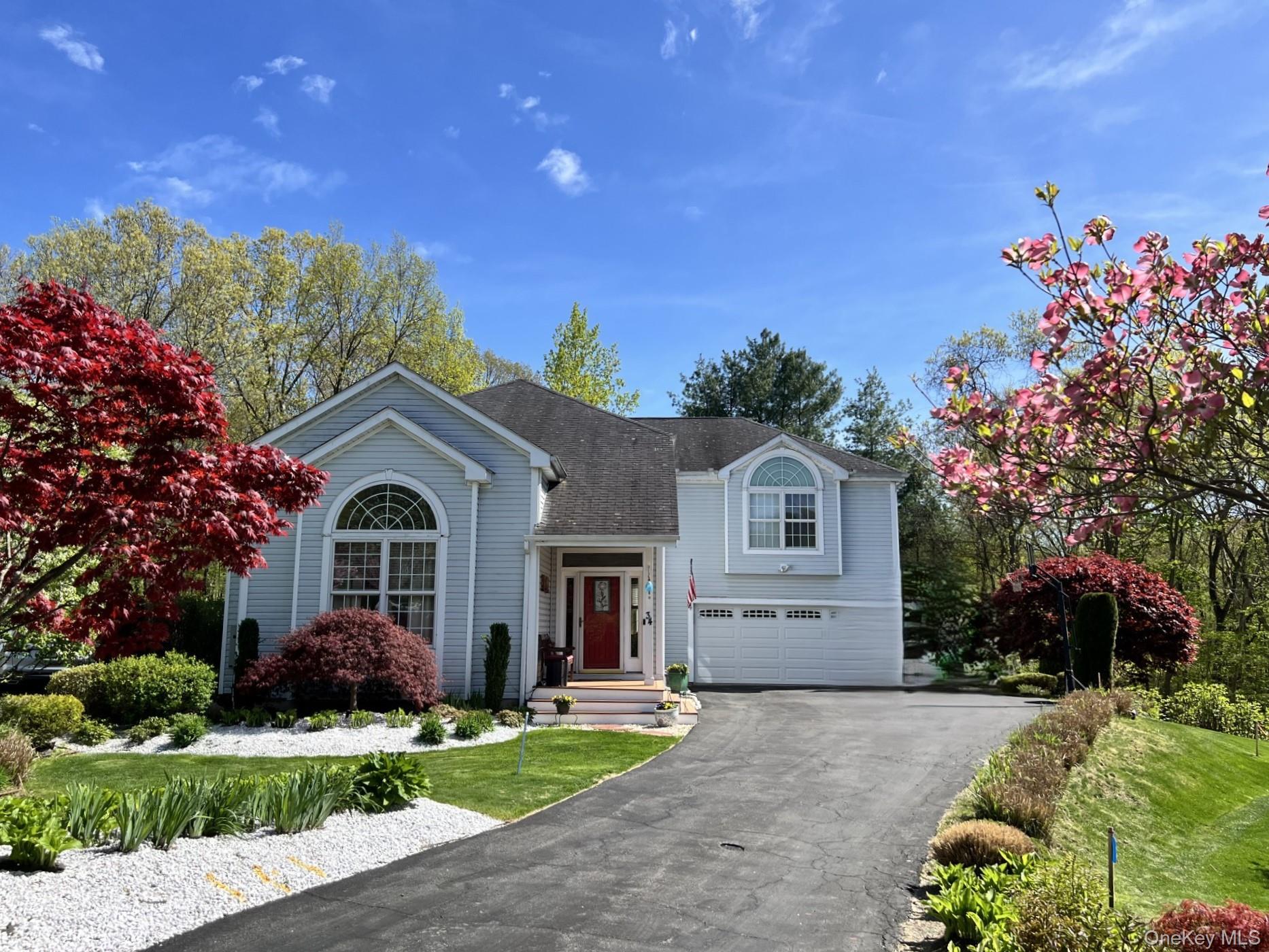 Beautifully Landscaped Front View of Home