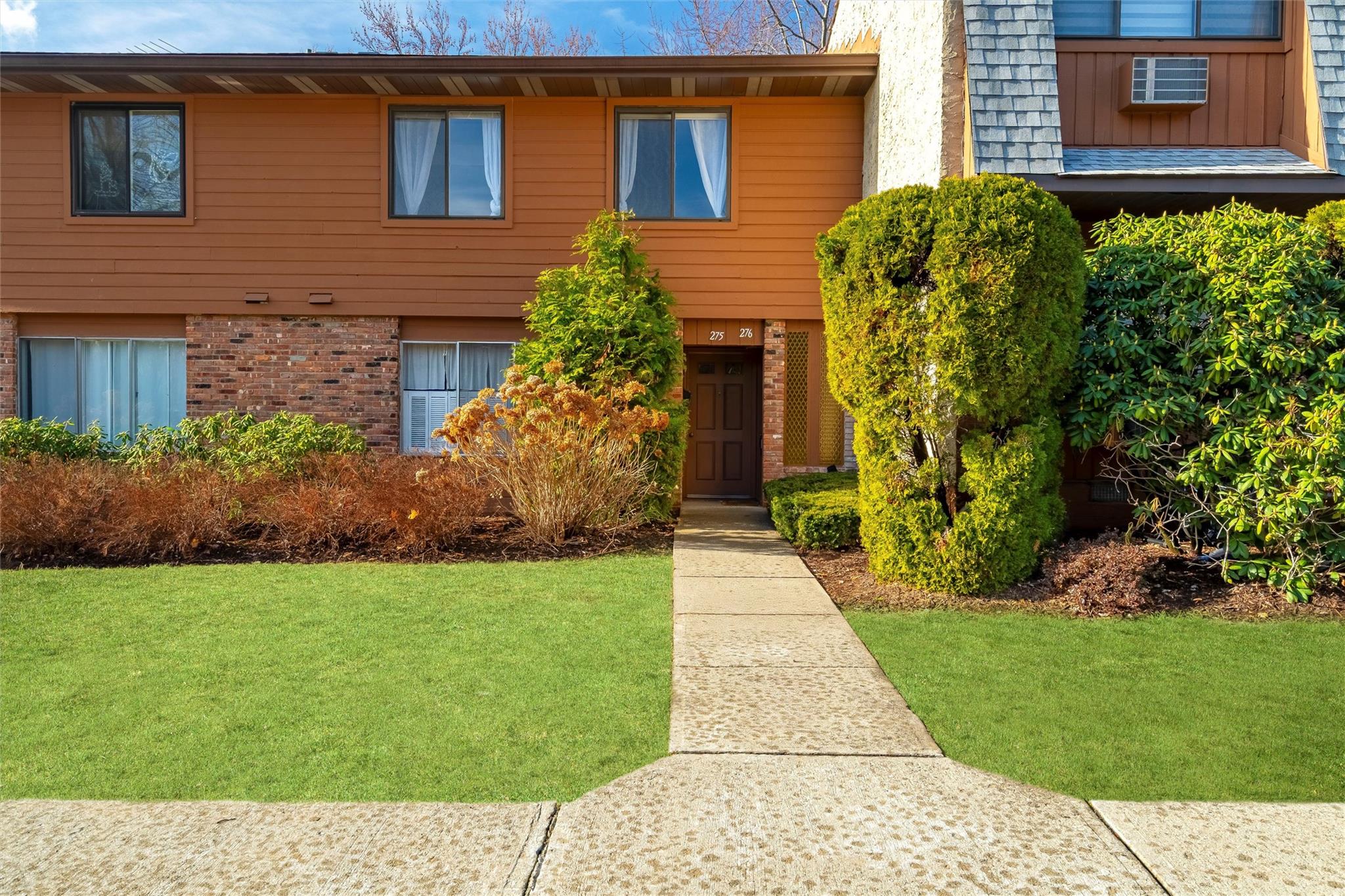 View of front of house with a front yard