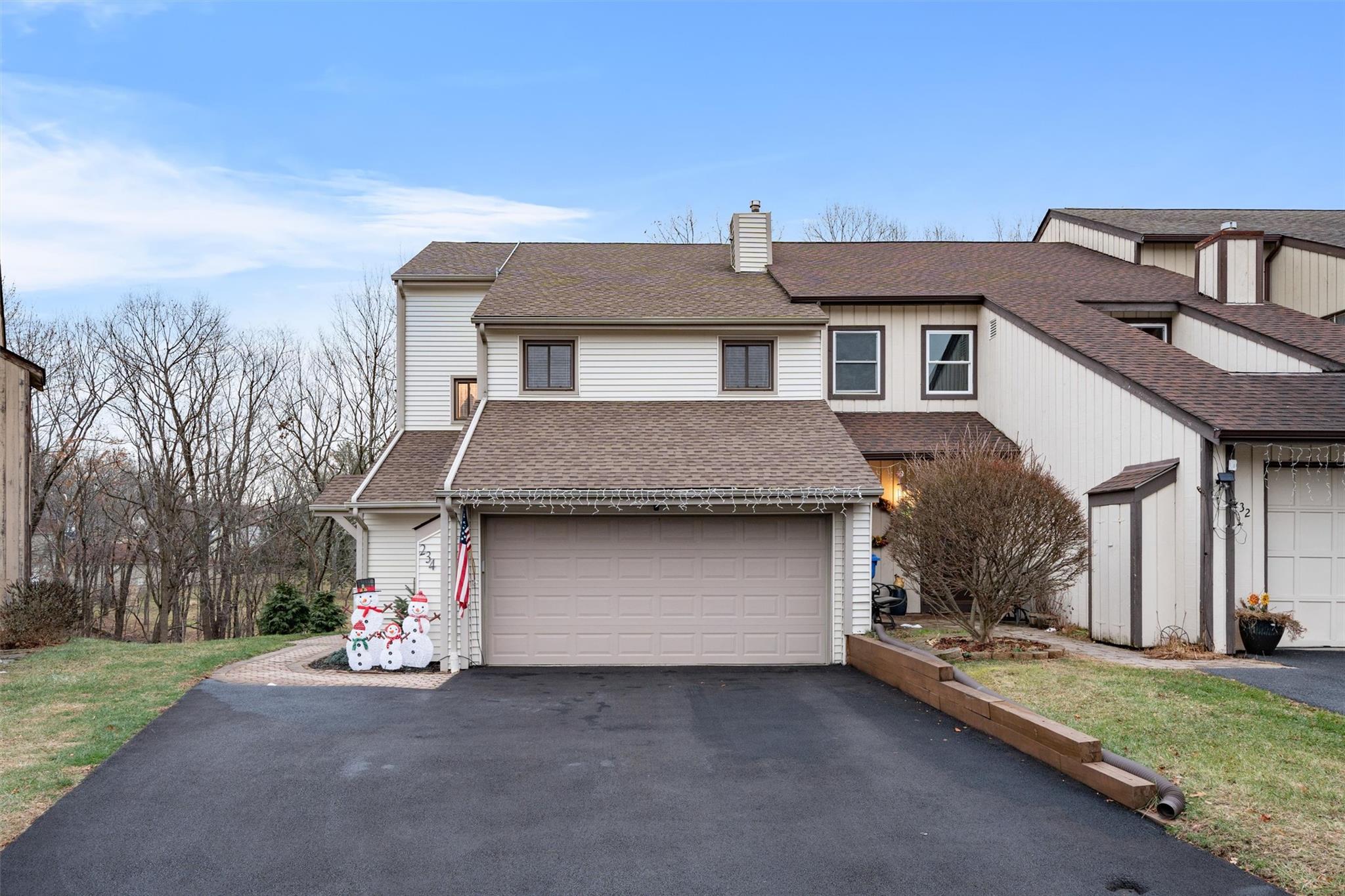 Front of property with a garage