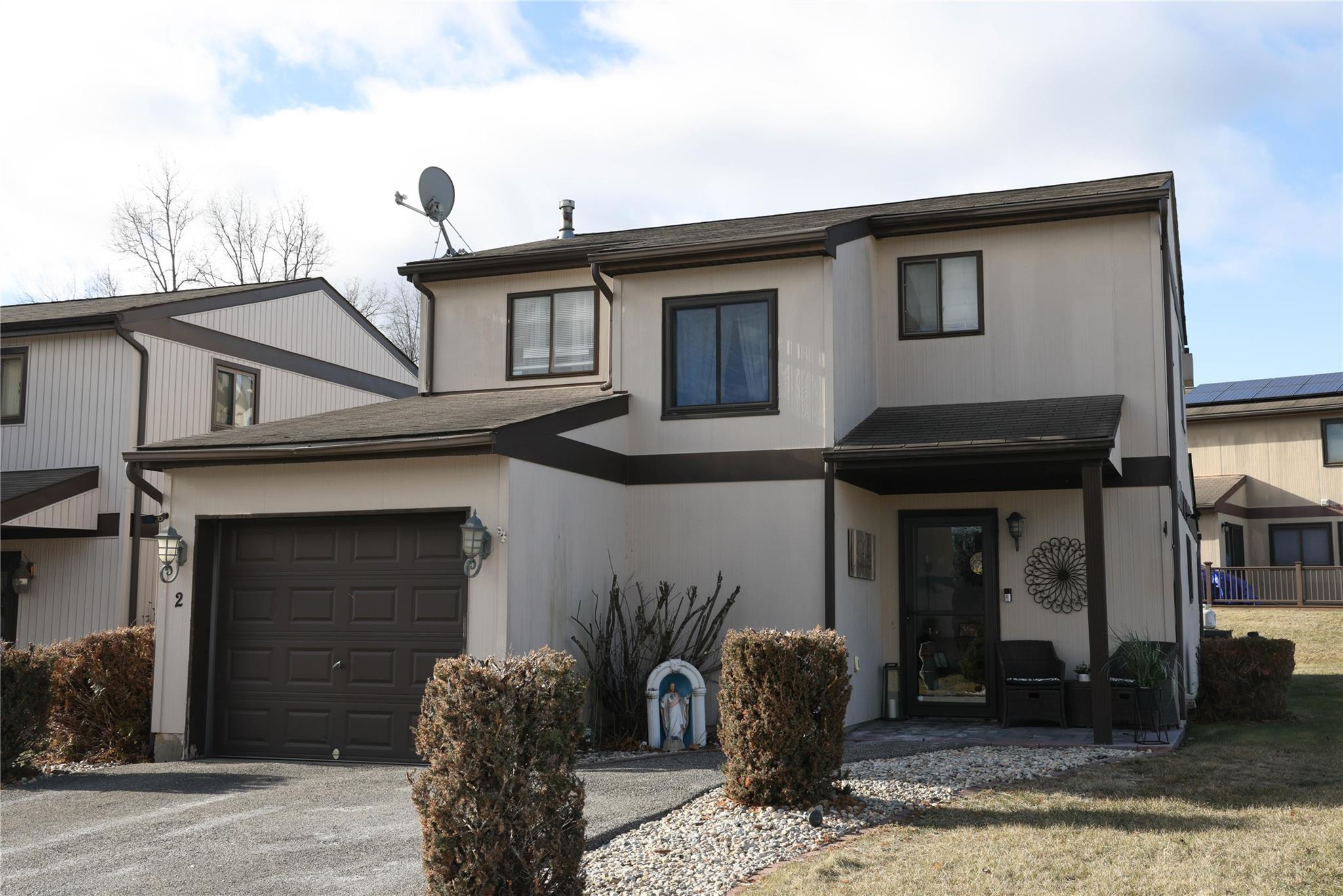 View of front of home featuring a garage