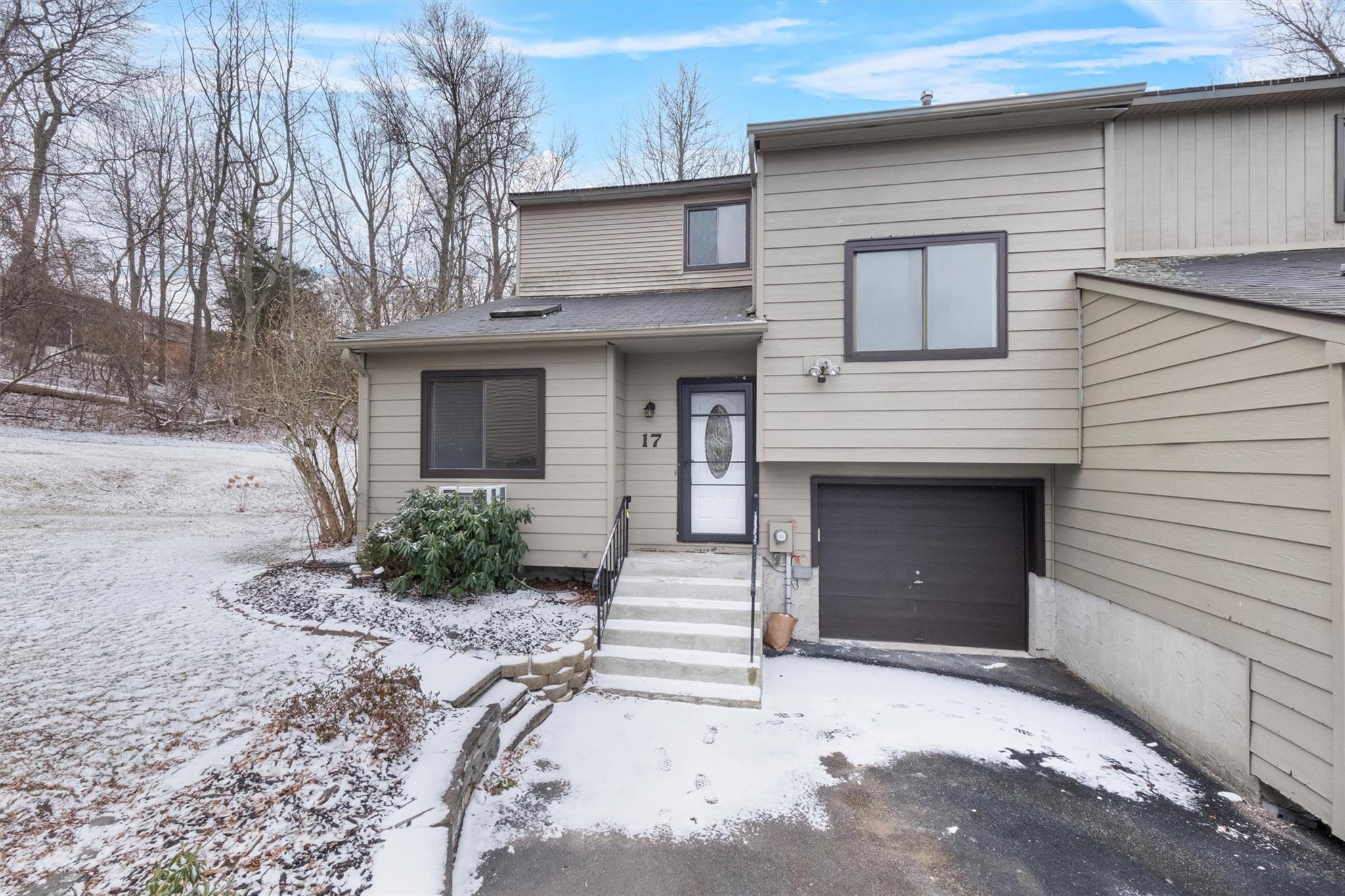 View of front of home with a garage