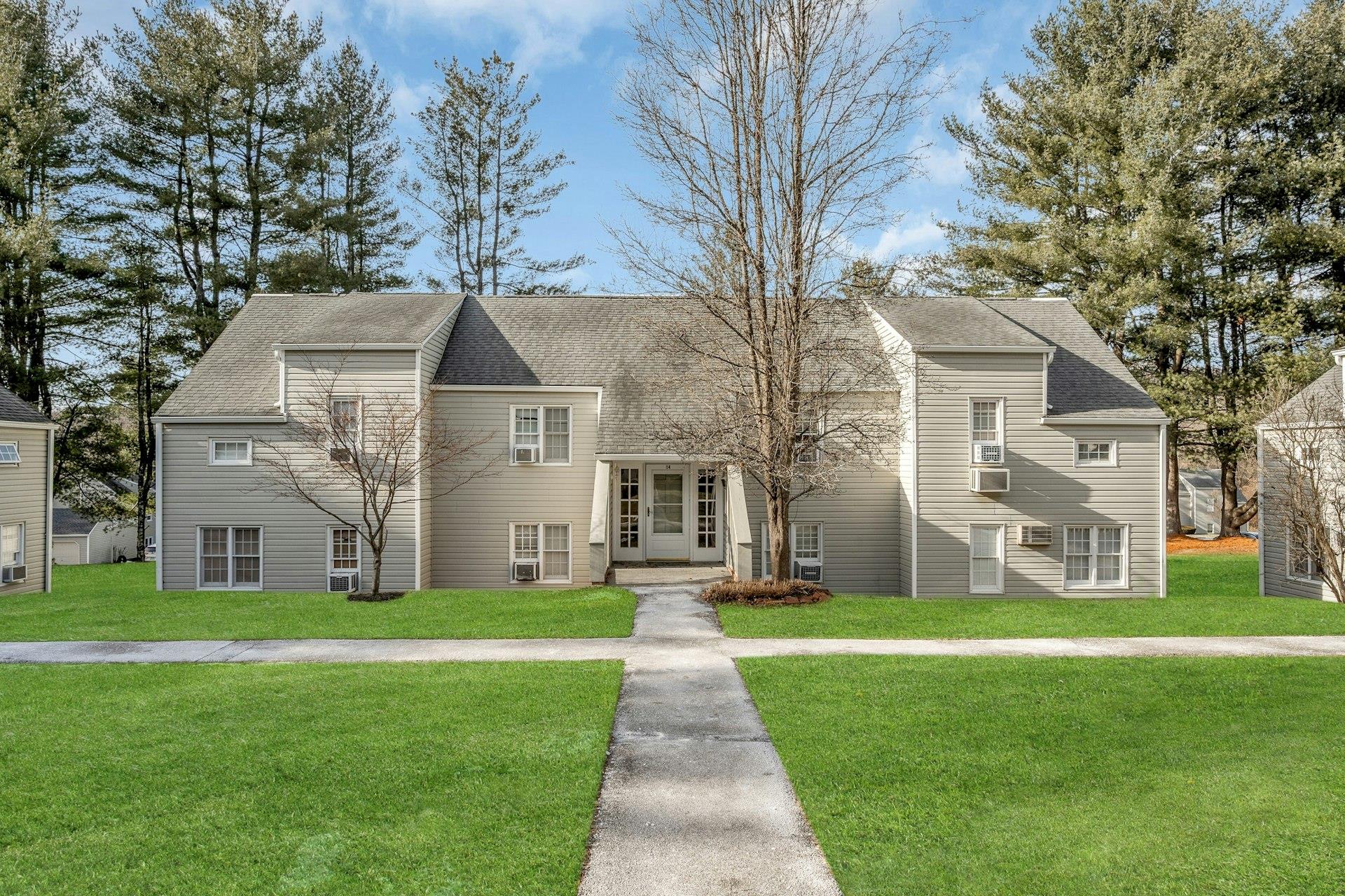 View of front of property featuring a front lawn