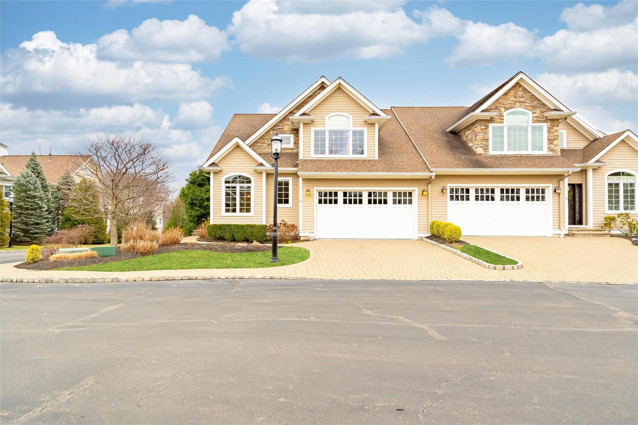 View of front of property with a garage