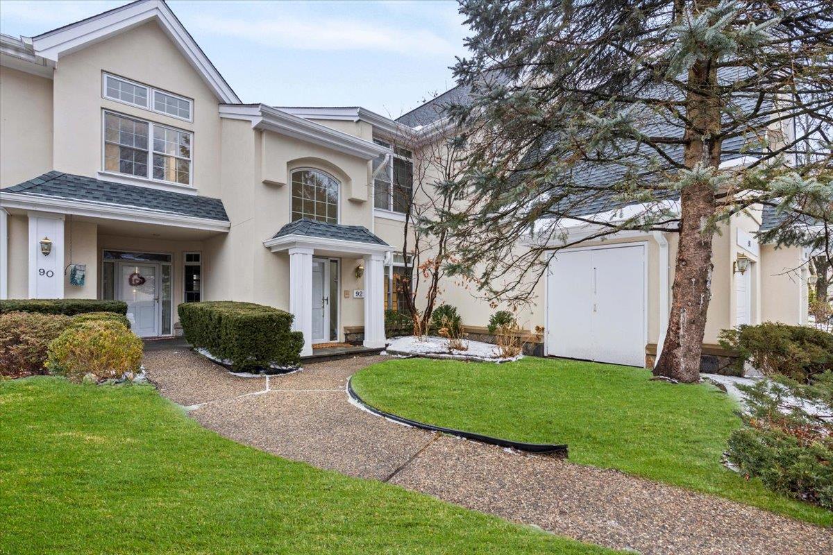 View of front facade with a front lawn