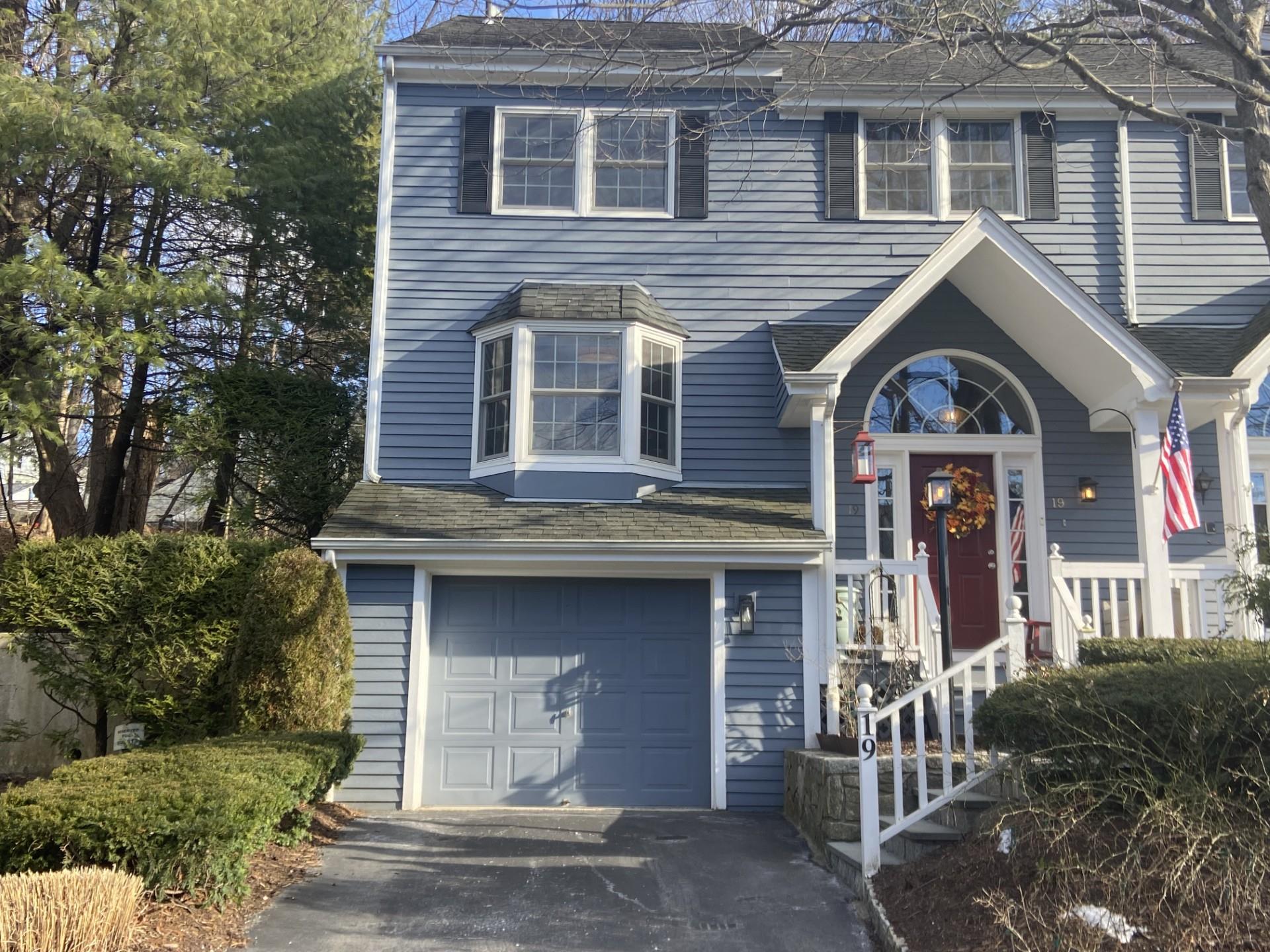 View of front of property with a garage