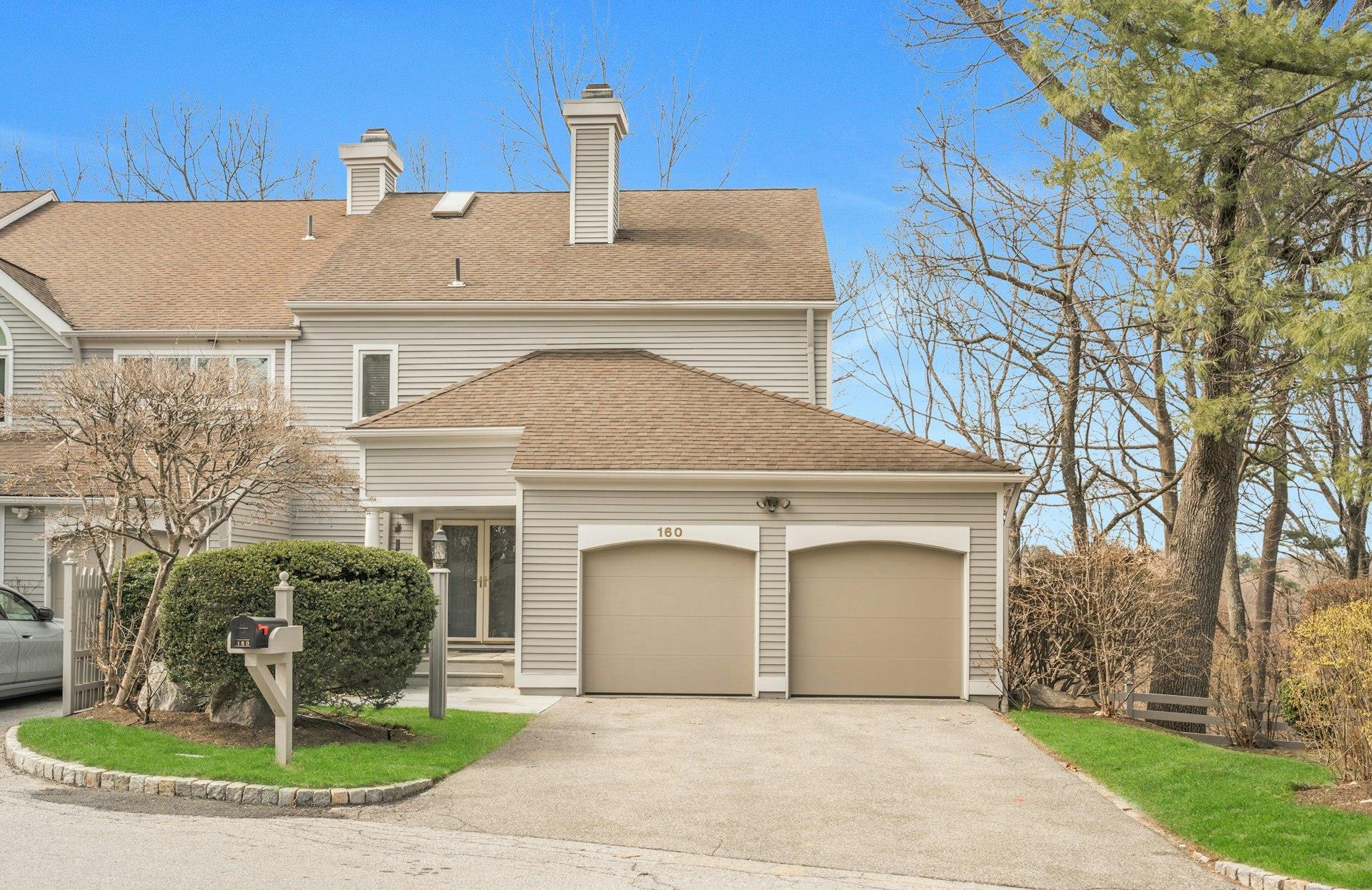 View of front of house with two car garage