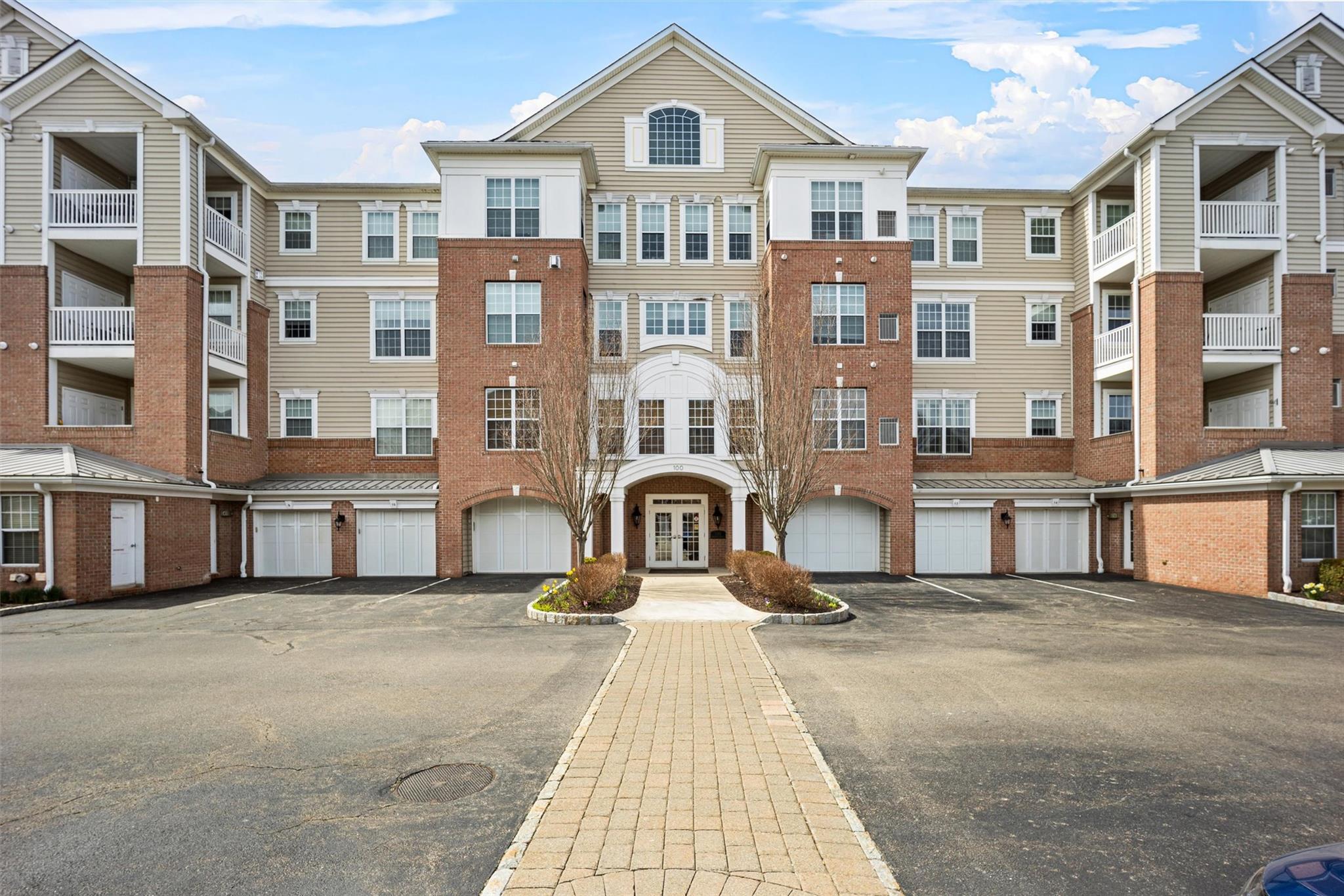 View of building exterior with driveway